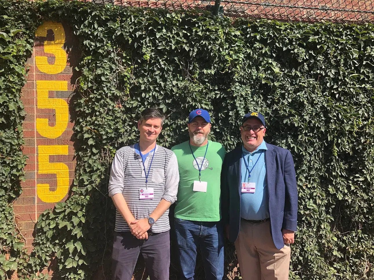 Joe Posnanski standing in front of Wrigley Field’s ivy-covered outfield wall with Michael Schur and Nick Offerman Joe Posnanski standing in front of Wrigley Field’s ivy-covered outfield wall with Michael Schur and Nick Offerman