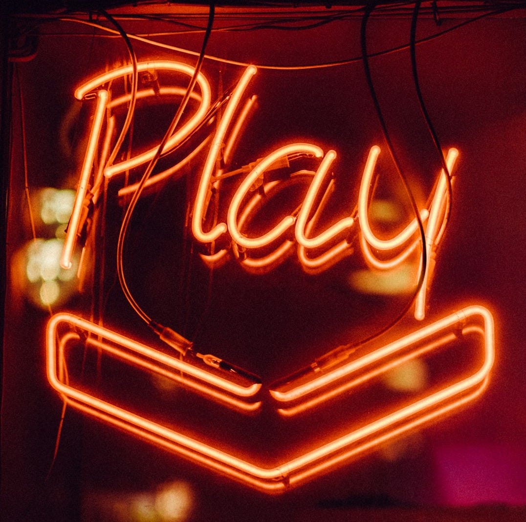 red Play neon light signage