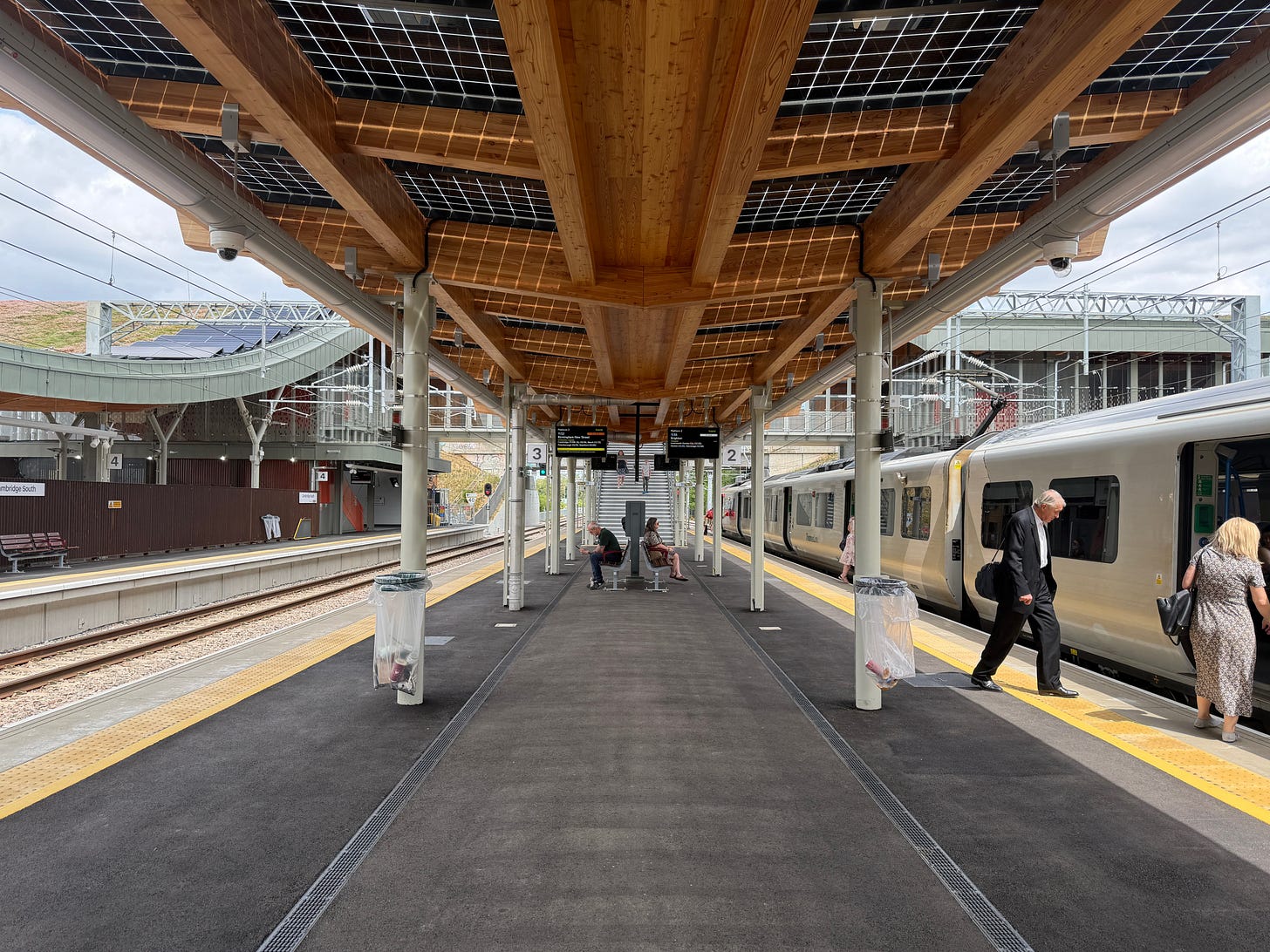 Photo of island platforms with solar panel canopy.