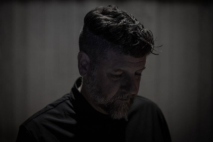 Photo of Mike Cadoo and his new album "Particle"