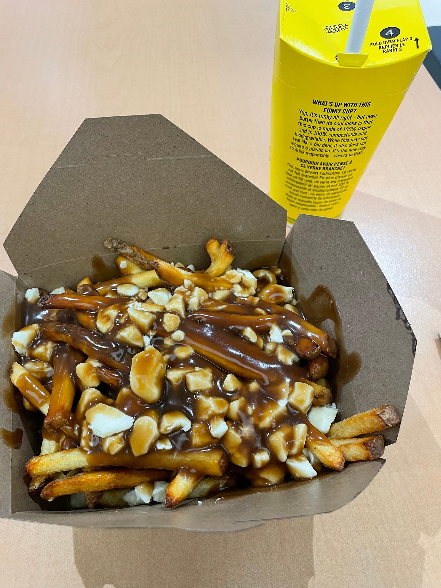 Poutine: french fries smothered in gravy and cheese curds
