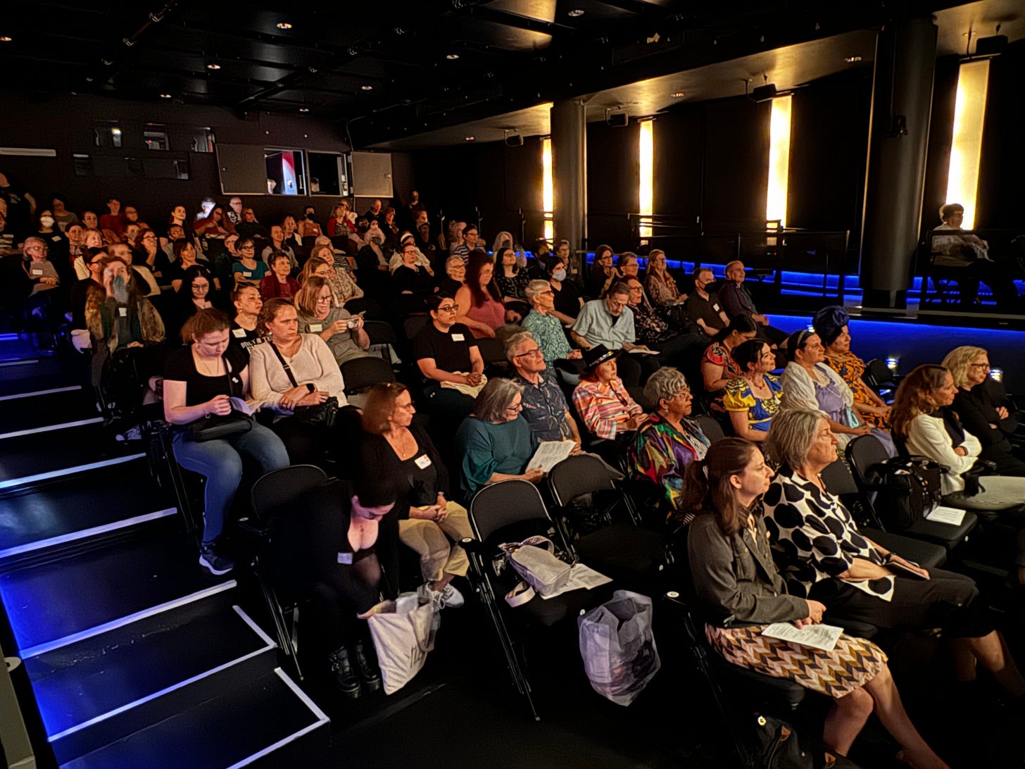 In a dark and back-lit theater, audience members gaze toward a stage, at the Leonard Nimoy Thalia at Symphony Space, in Manhattan In a dark and back-lit theater, audience members gaze toward a stage, at the Leonard Nimoy Thalia at Symphony Space, in Manhattan