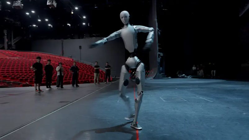 A robot dancing in a theater

AI-generated content may be incorrect.