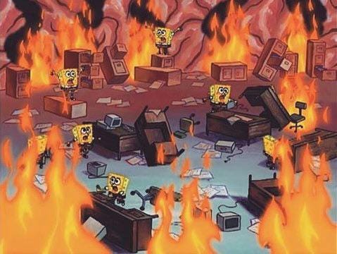 A chaotic cartoon scene from SpongeBob SquarePants showing multiple SpongeBobs in an office engulfed in flames. Papers, desks, and filing cabinets are scattered and burning, while the SpongeBobs frantically run around, adding to the sense of panic and disorder.