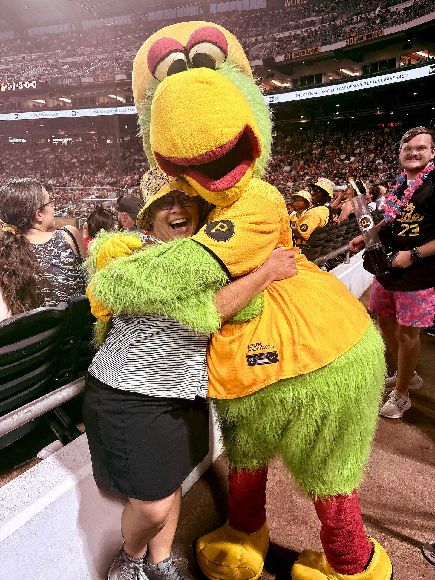 woman in a bucket hat with the Pirate Parrot