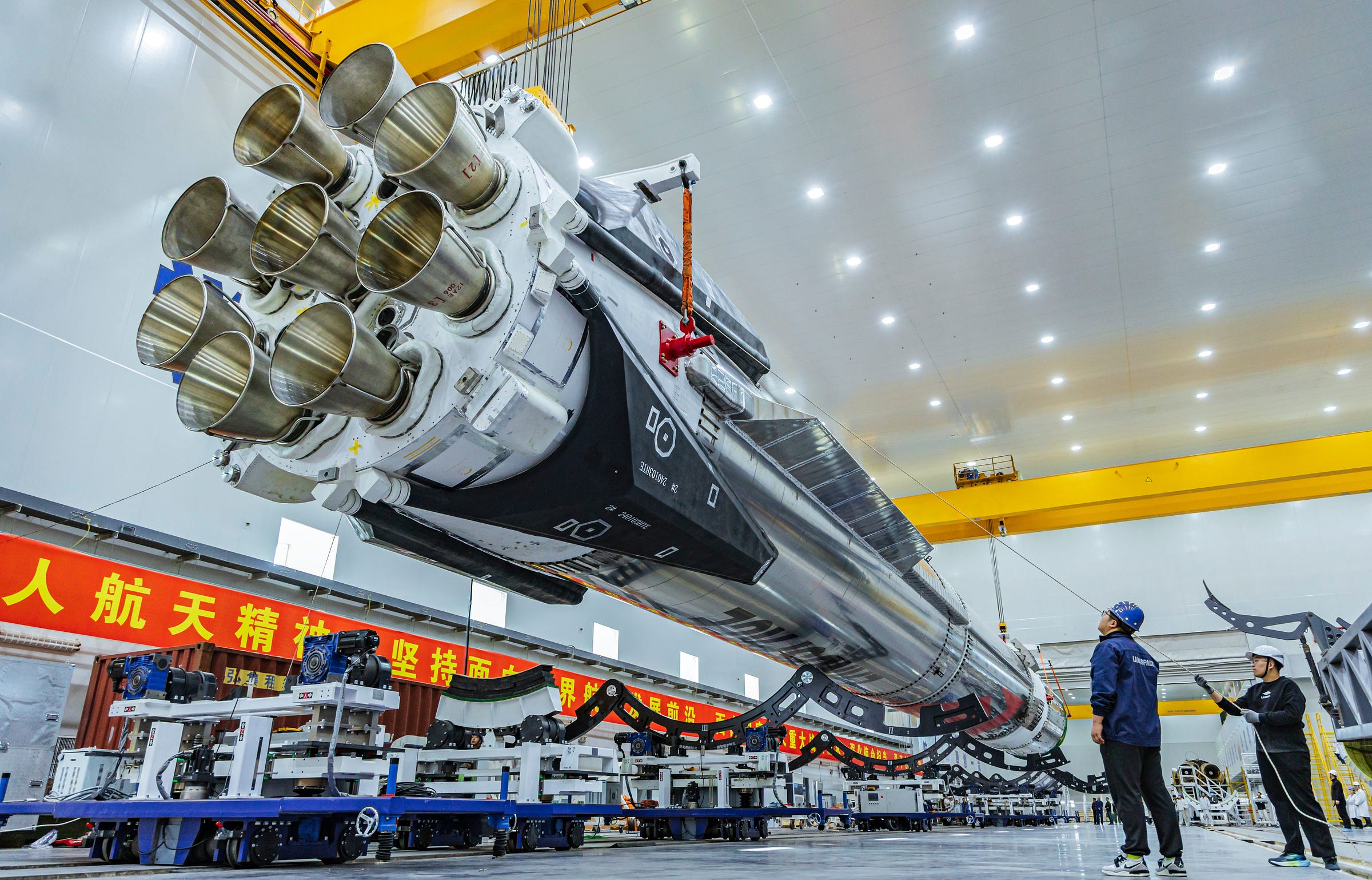 The Zhuque-3 Y1 vehicle being lifted onto its transporter-erector in late 2025 at the Jiuquan Satellite Launch Center.