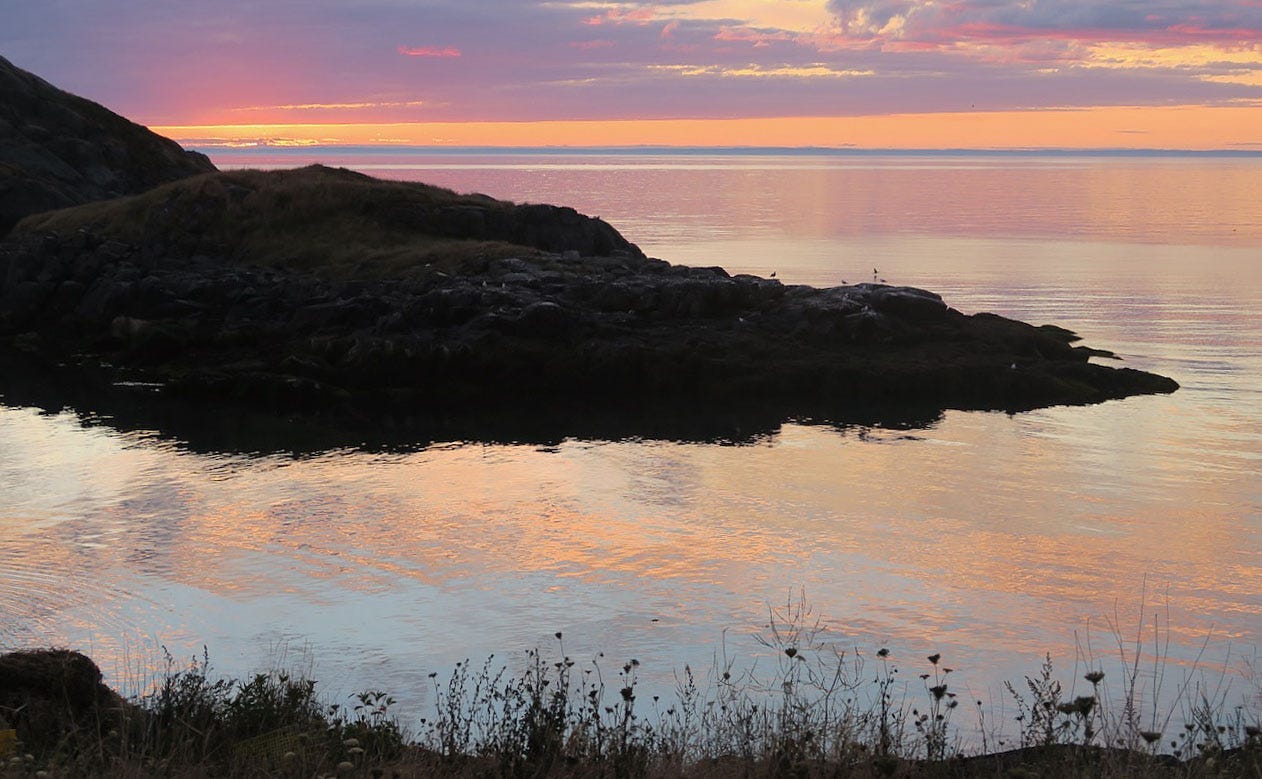 A body of water with hills around it

Description automatically generated with low confidence