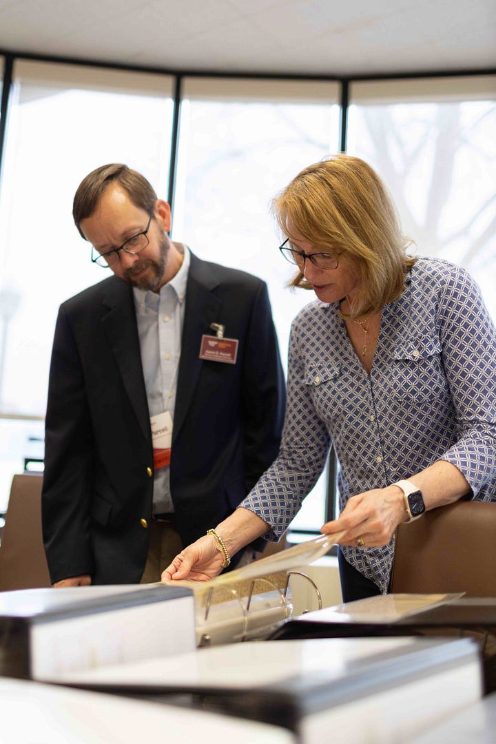 A letter from the collection; Aaron D. Purcell, director of University Libraries Special Collections and University Archives looks through the letters with Sue Heth Bell. Photo by Case Parker for Virginia Tech.