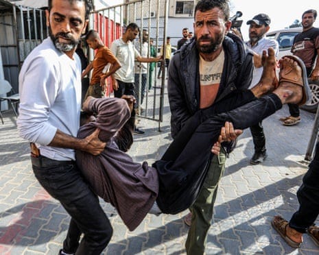 At least 27 Palestinians killed by Israeli fire at food point, Gaza  officials say | Gaza | The Guardian