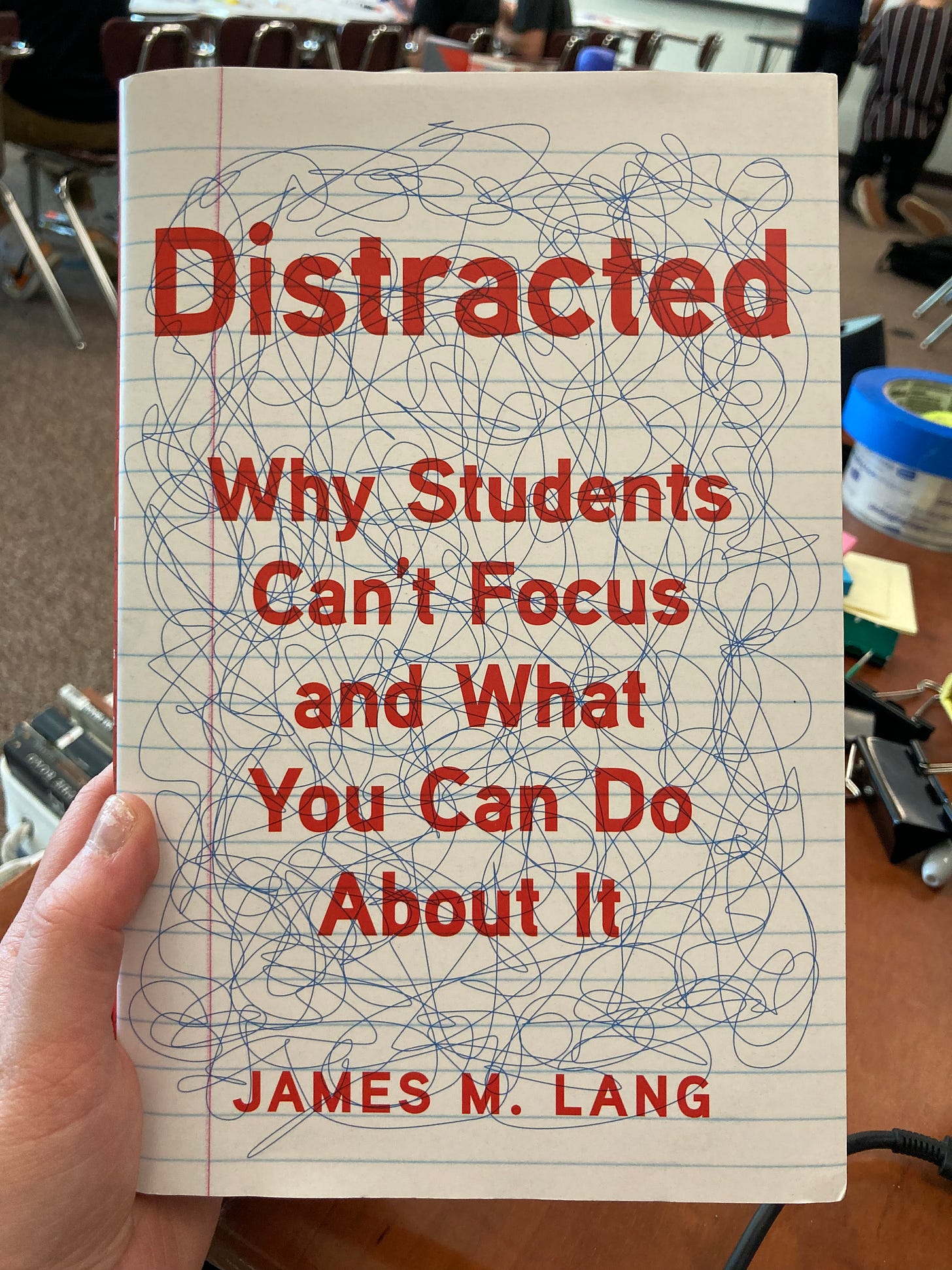 Book cover of Distracted: Why Students Can't Focus and What You Can Do About It