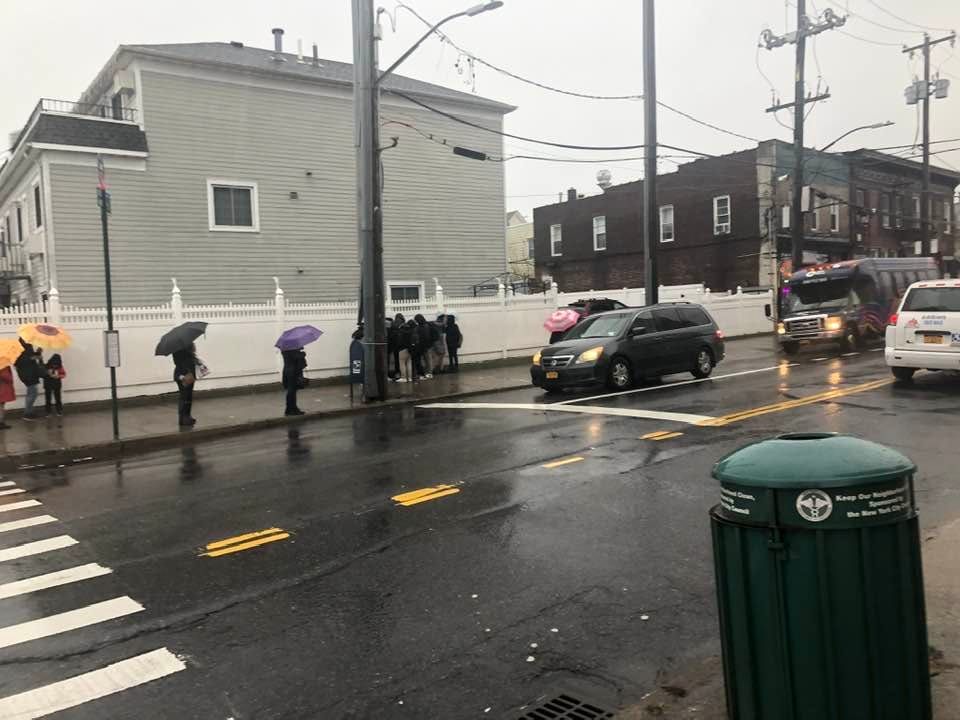 May be an image of 10 people and street
