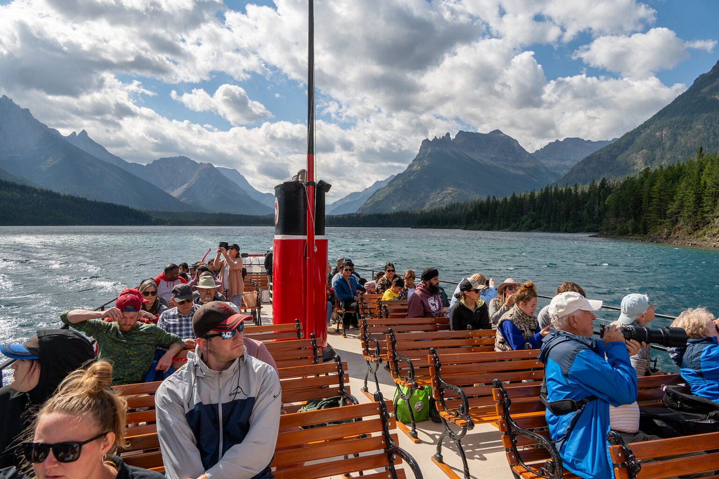 One of the boats that runs between Waterton Townsite and Goat Haunt is the International. Built in 1927, the International has carried thousands of visitors across the border during its lifetime. Passengers can disembark for a brief sightseeing opportunity, while others take the boat to start multi-day backpacking trips. (Photo by Glacier National Park / NPS) One of the boats that runs between Waterton Townsite and Goat Haunt is the International. Built in 1927, the International has carried thousands of visitors across the border during its lifetime. Passengers can disembark for a brief sightseeing opportunity, while others take the boat to start multi-day backpacking trips. (Photo by Glacier National Park / NPS)
