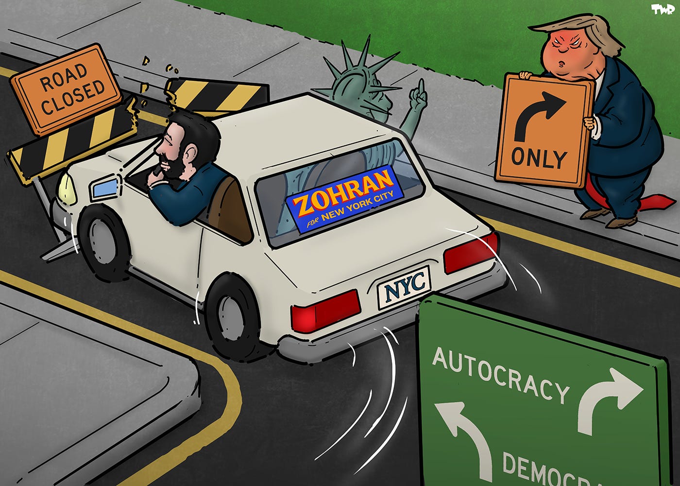 Cartoon showing Zohran Mamdani driving in a car with the Statue of Liberty. They are taking a sharp left turn, breaking through a fence with a Road closed' sign, while an angry Trump stands on the pavement holding an only right turns sign. Meanwhile Lady Liberty is leaning out the window giving Trump the finger.