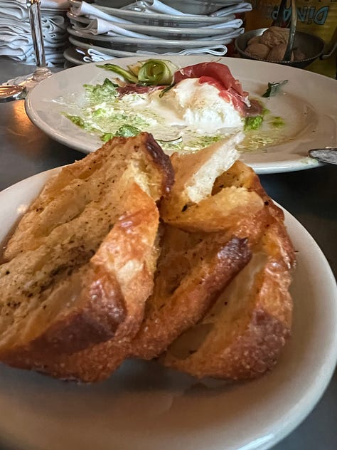 burrata with lemon peas and asparagus with toast points from slim's pizzeria