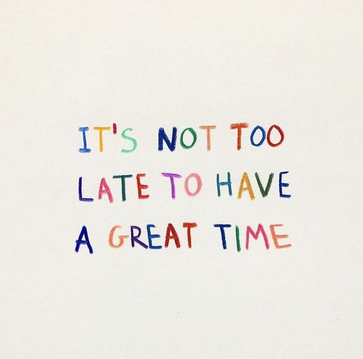 This may contain: the words it's not too late to have a great time written in colored crayons