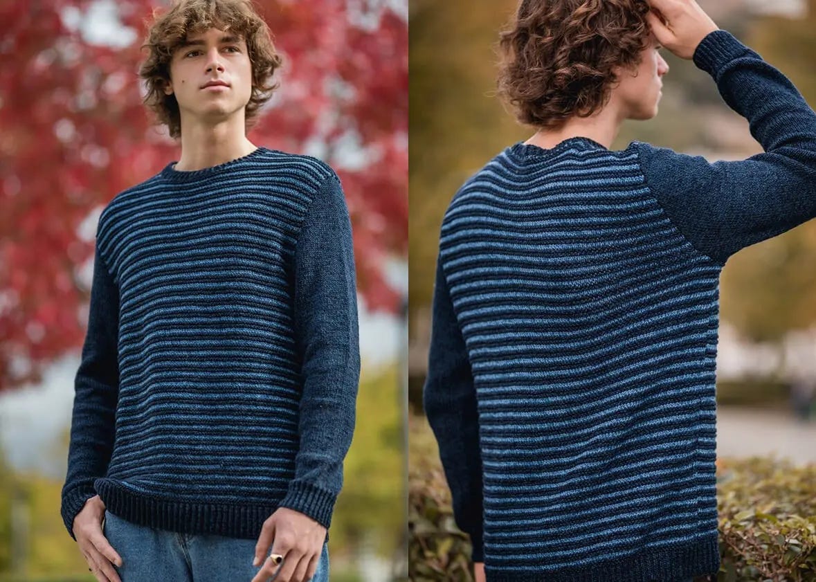 young man wearing a light blue and navy striped sweater
