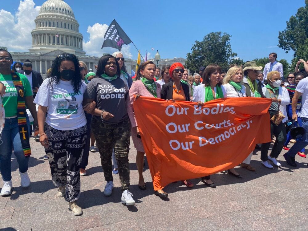 abortion rights activists marching shutt abortion rights activists marching