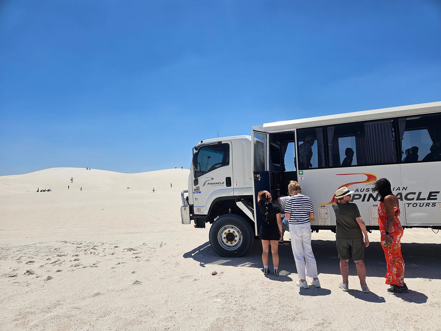 4WD bus takes visitors bouncing across the dunes