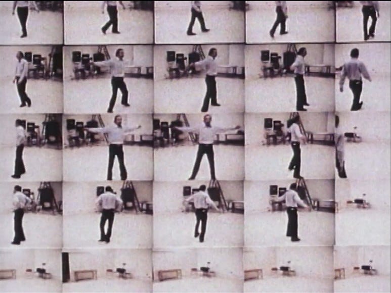 the same shot of a man stretching out his arms, spinning in place, then running out of frame plays out in a 5x5 grid where each square is timed slightly differently