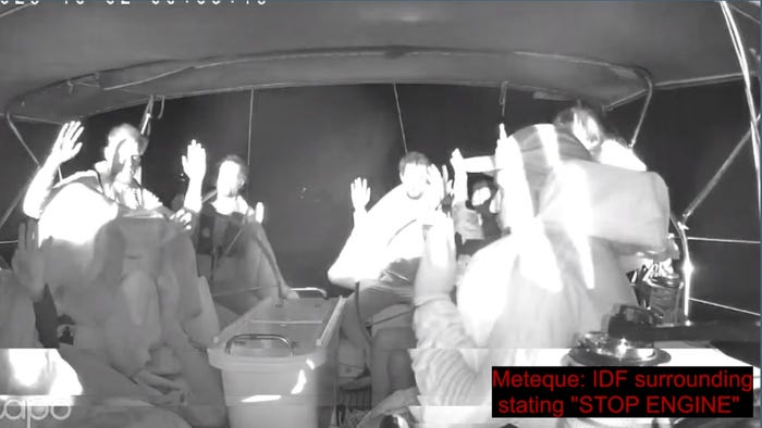 Sailors on the Meteque, a boat with the Global Sumud Flotilla, held their hands above their heads as Israeli forces ordered them to stop their engine off the 