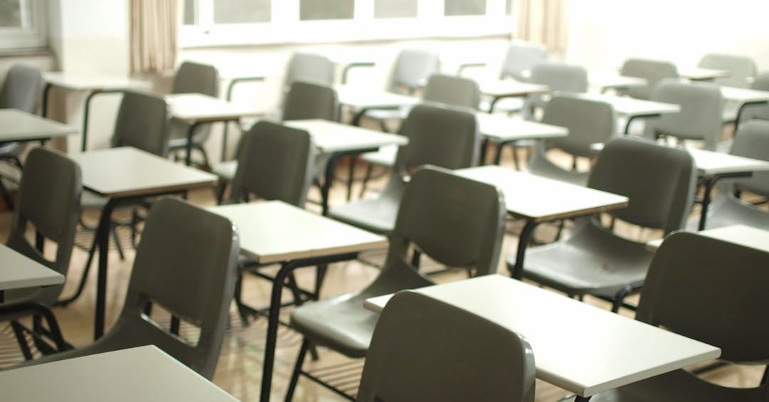 white table with black chairs