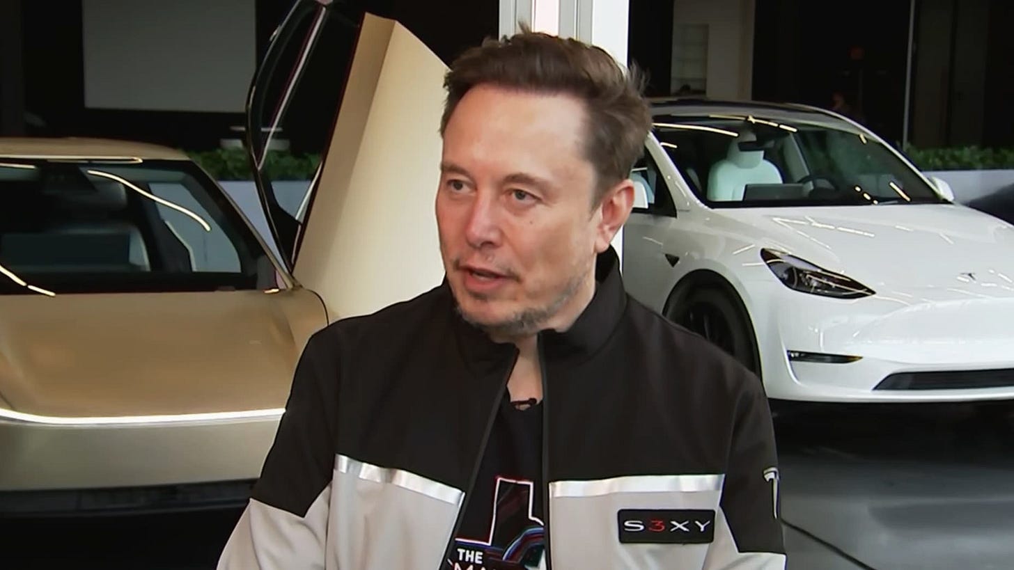 Elon Musk interviews on CNBC from the Tesla headquarters in Texas.