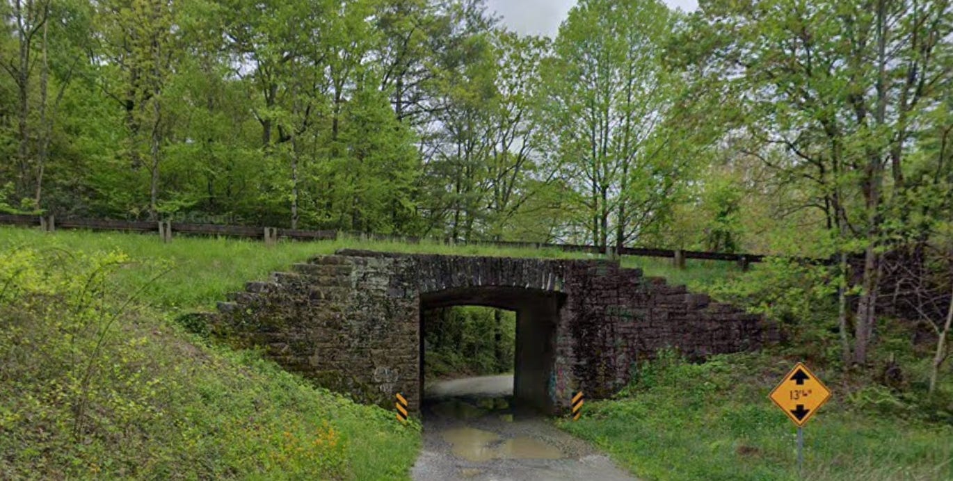 Bridge over crummy road.