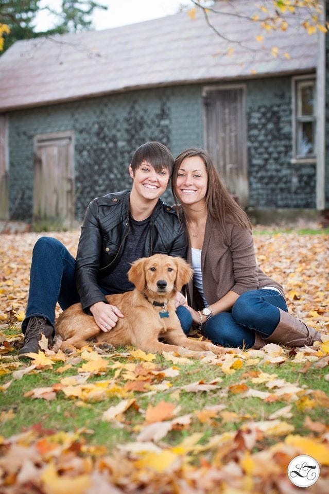 lesbian couple with pet lesbian couple with pet