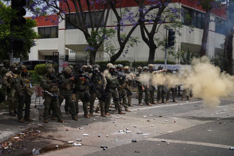 Clashes in Los Angeles as protests against immigration raids continue