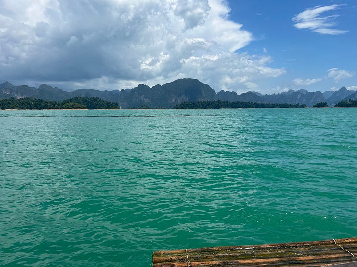 Landscape pics of turquoise water, and a lake reflecting a sunrise.