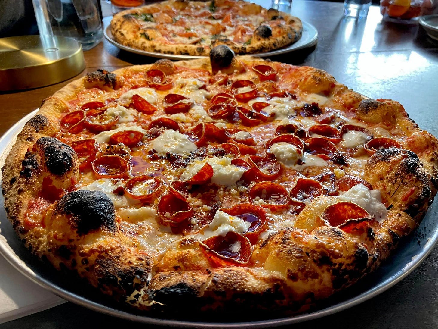 May be an image of pizza