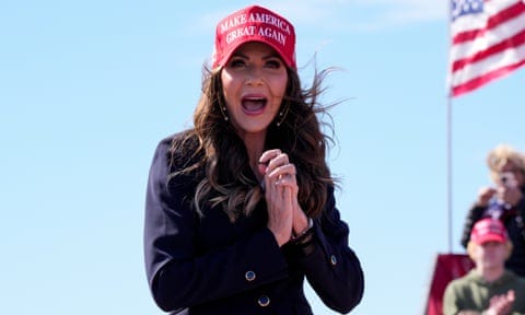 woman wearing a red baseball cap