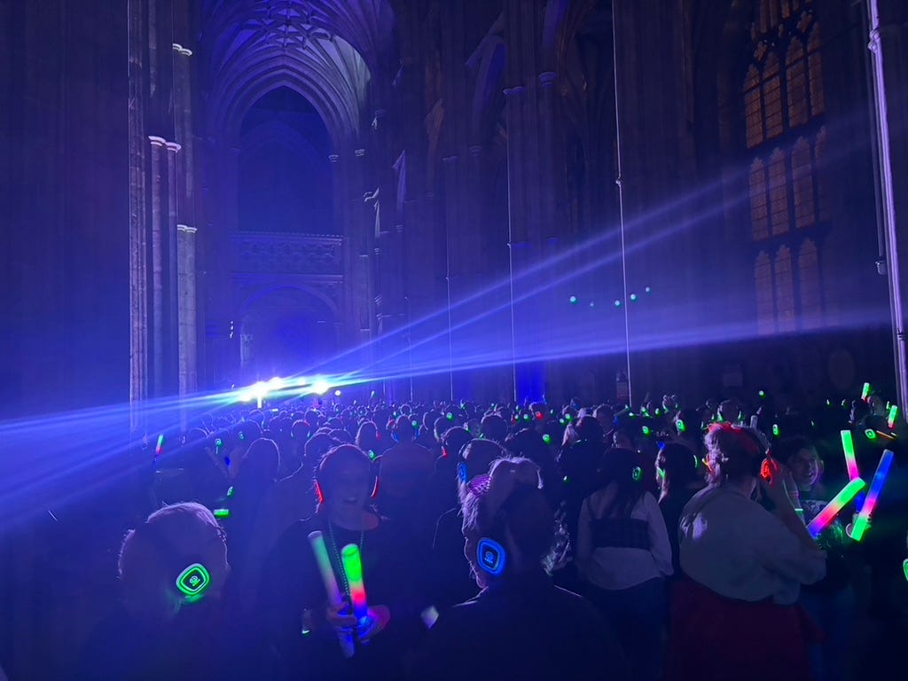 Inside the Canterbury Cathedral the rave continued with protesters gathered outside in the rain. Inside the Canterbury Cathedral the rave continued with protesters gathered outside in the rain.