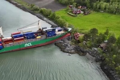 Norwegian man wakes to find cargo ship in his yard