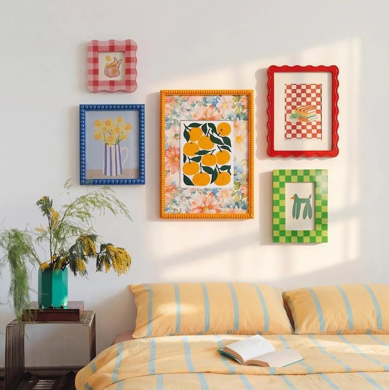 A colorful array of gallery images with frames in primary colors A colorful array of gallery images with frames in primary colors