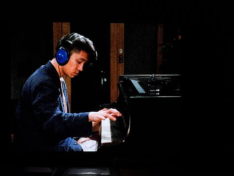 Still images from Tokyo Melody: three photos of Sakamoto recording piano in the studio.