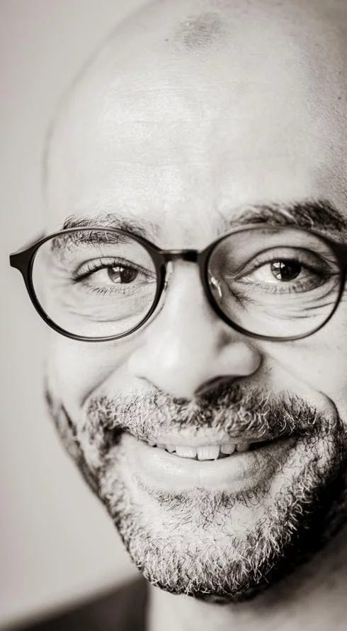 Close up portrait of Mo Gawdat Close up portrait of Mo Gawdat