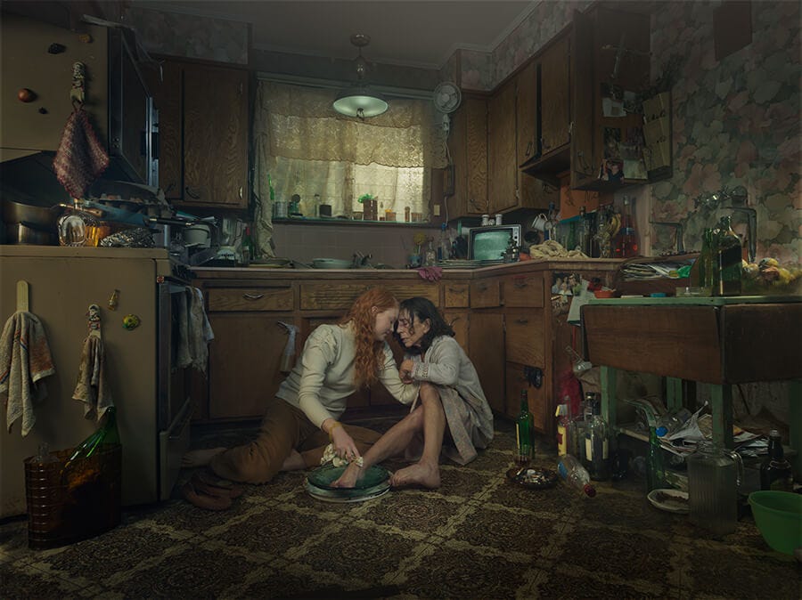 Girl lovingly washing an alcoholic's feet Girl lovingly washing an alcoholic's feet