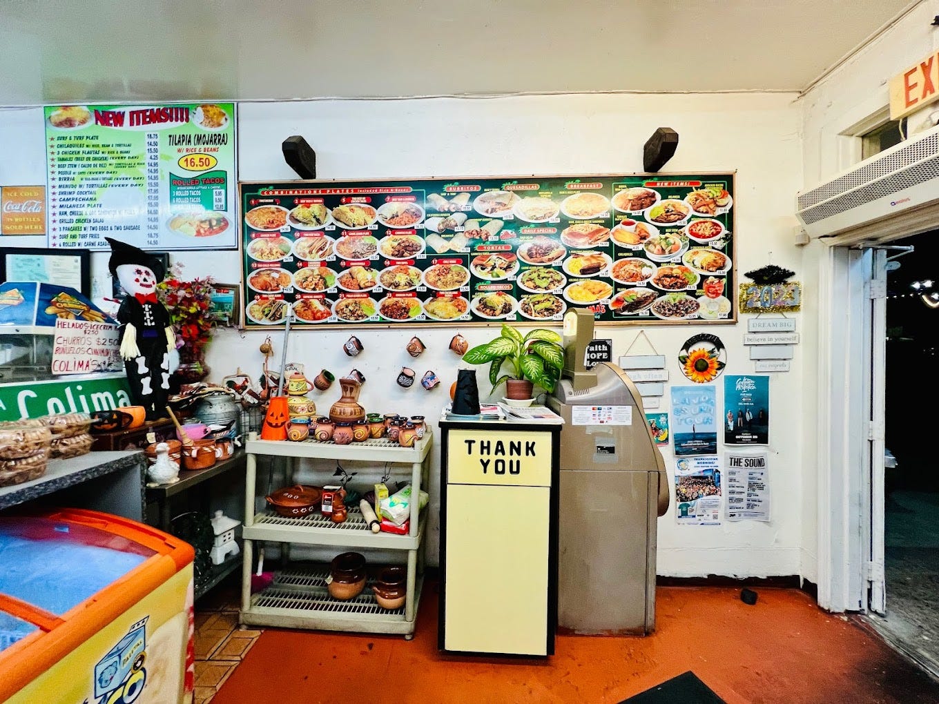 Colima's Mexican Restaurant main entrance, photos of all of their Mexican entries, and where you order.