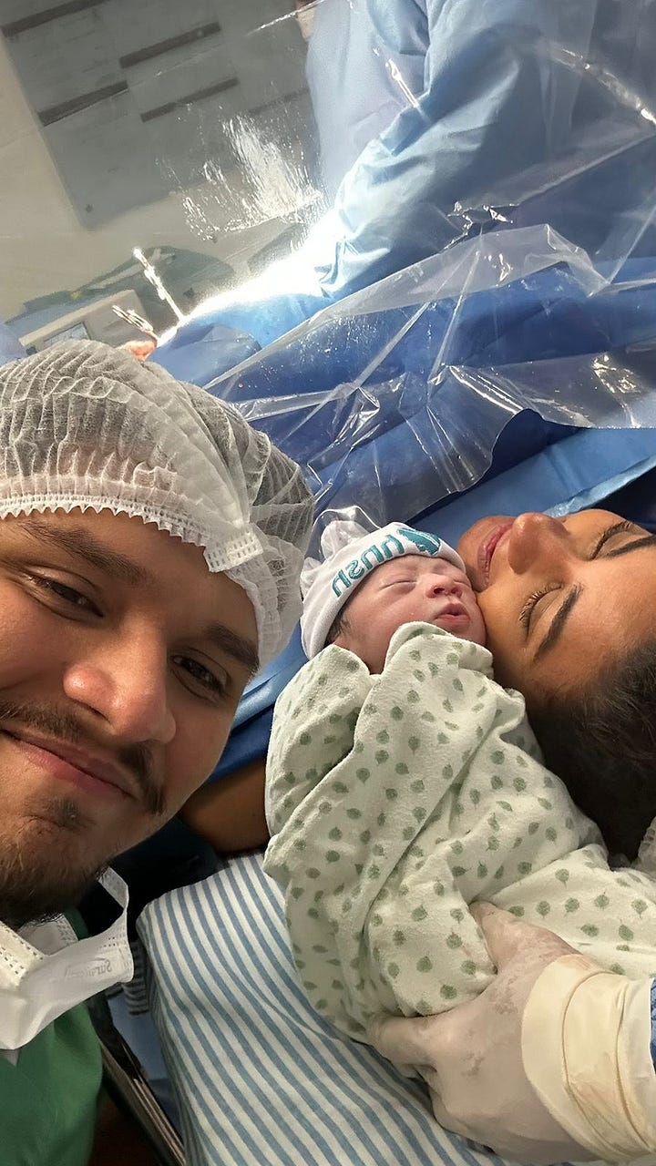 Picture o baby Levi and pciture.  Photo of Renato with hospital hairnet and Levi laying next to Ingrid's head surrounded by the hospital bed.