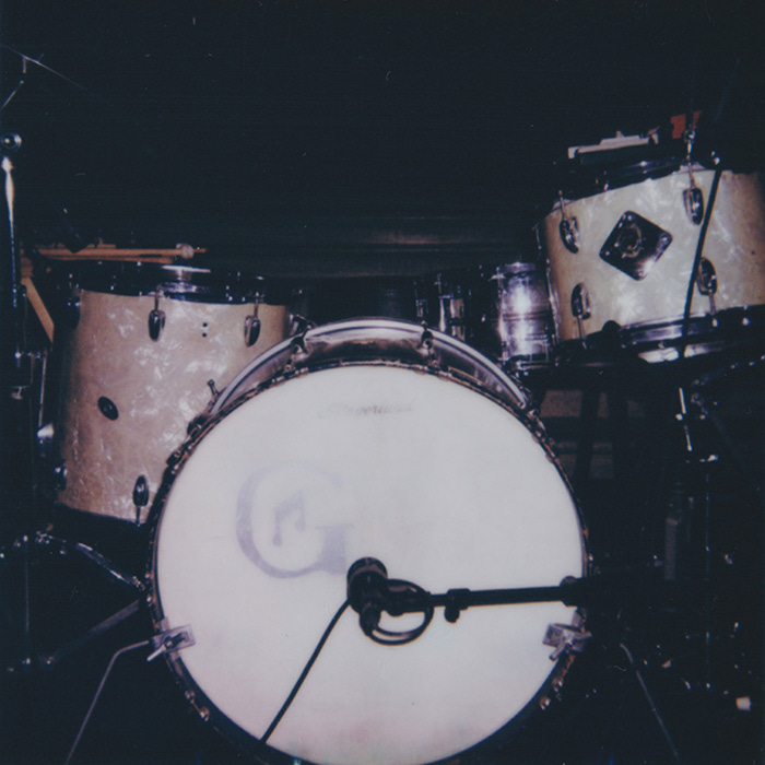 A cow / a drum set / making van coffee / a skeleton 