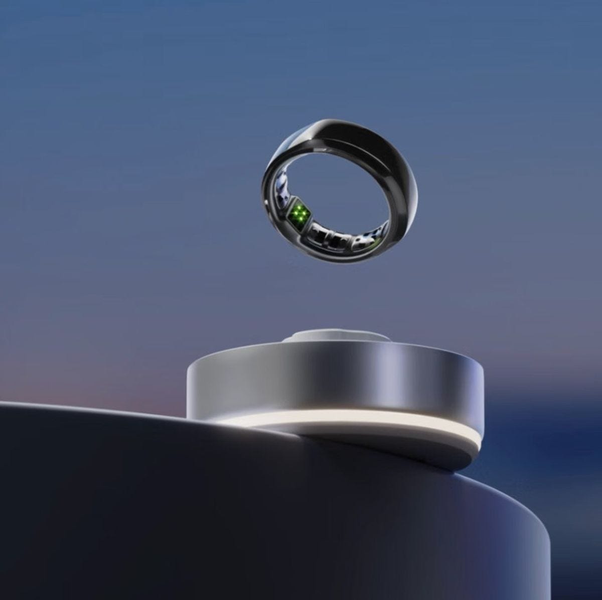 The Happy Ring smart ring, with its green sensor lights visible on the inner band, floating above its charging dock