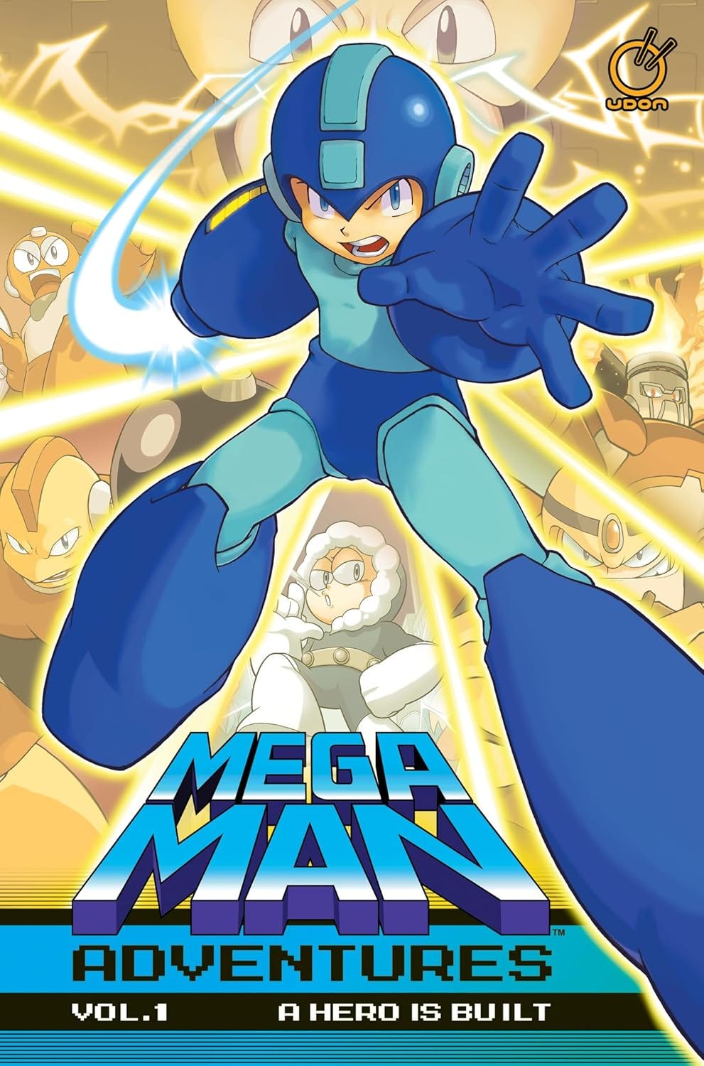 The image shows the cover of "Mega Man Adventures Vol. 1: A Hero Is Built", published by Udon Entertainment. The artwork features Mega Man in a dynamic pose, reaching forward with energy beams shooting across the cover. Surrounding him are several iconic Robot Masters from the Mega Man series, such as Cut Man, Ice Man, and Guts Man. The style is vibrant and action-packed, emphasizing the retro roots of the franchise while appealing to both long-time fans and younger readers. This graphic novel continues Udon’s tradition of celebrating classic video game characters through high-quality comics. The image shows the cover of "Mega Man Adventures Vol. 1: A Hero Is Built", published by Udon Entertainment. The artwork features Mega Man in a dynamic pose, reaching forward with energy beams shooting across the cover. Surrounding him are several iconic Robot Masters from the Mega Man series, such as Cut Man, Ice Man, and Guts Man. The style is vibrant and action-packed, emphasizing the retro roots of the franchise while appealing to both long-time fans and younger readers. This graphic novel continues Udon’s tradition of celebrating classic video game characters through high-quality comics.