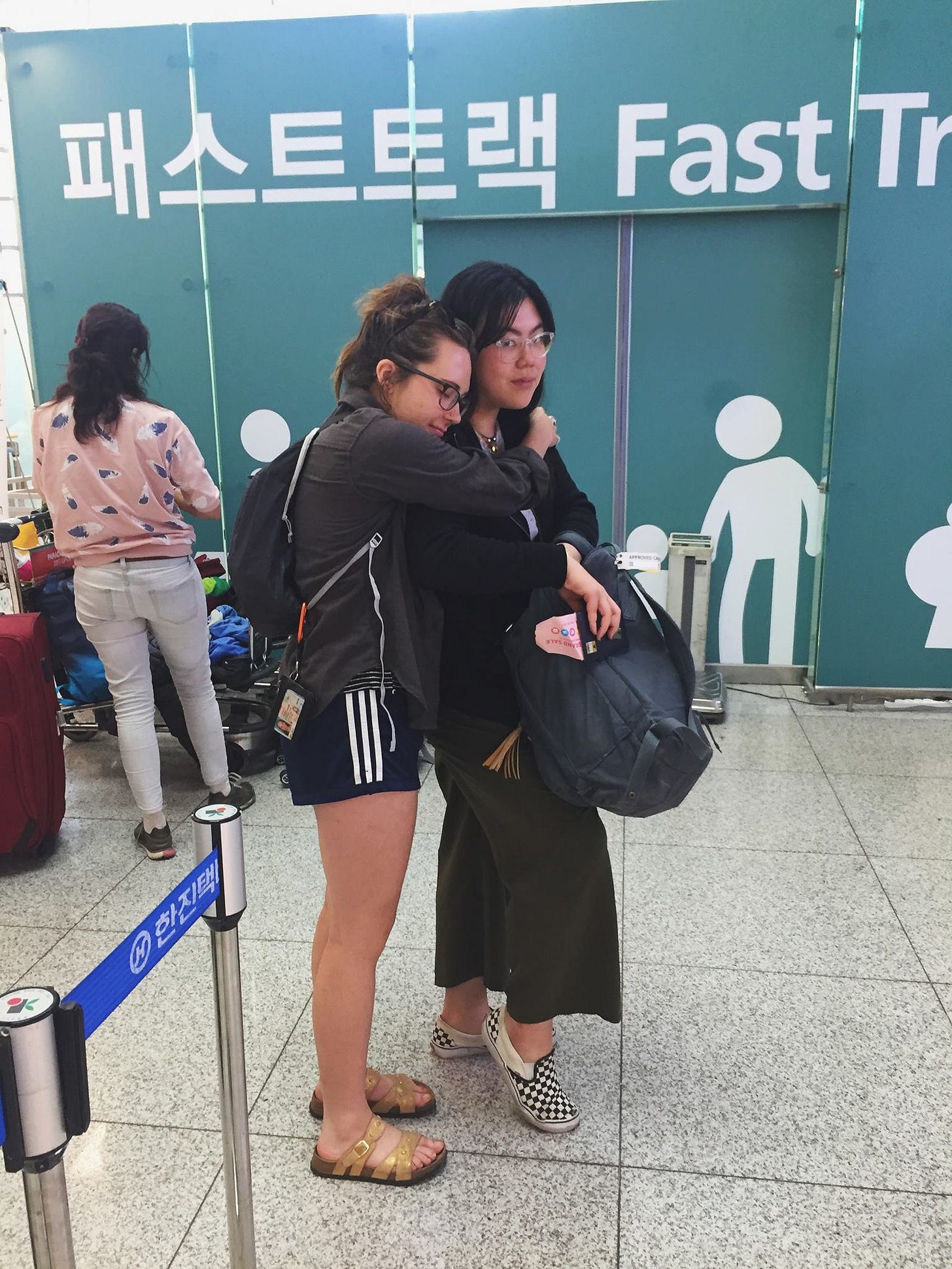 May be an image of 2 people, including Han Na Shin