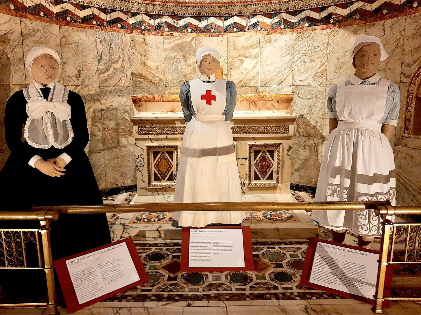 Three nurses uniforms from the 19th century to the 1950s.
