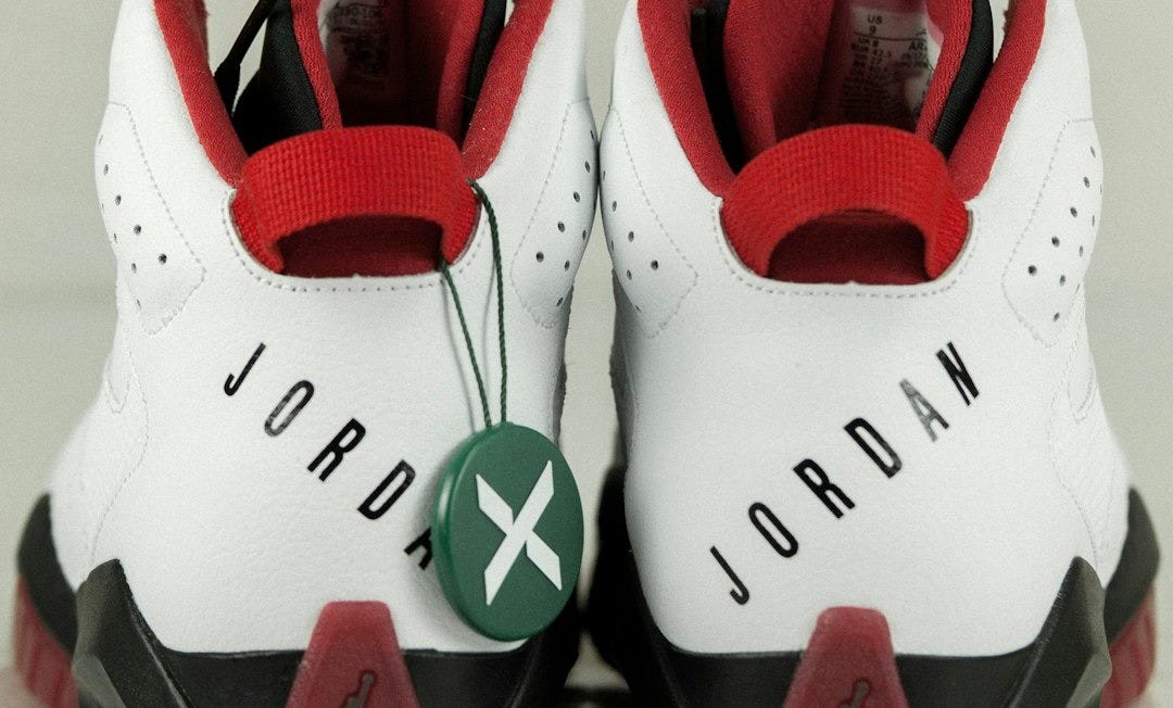 a pair of red and white shoes a pair of red and white shoes