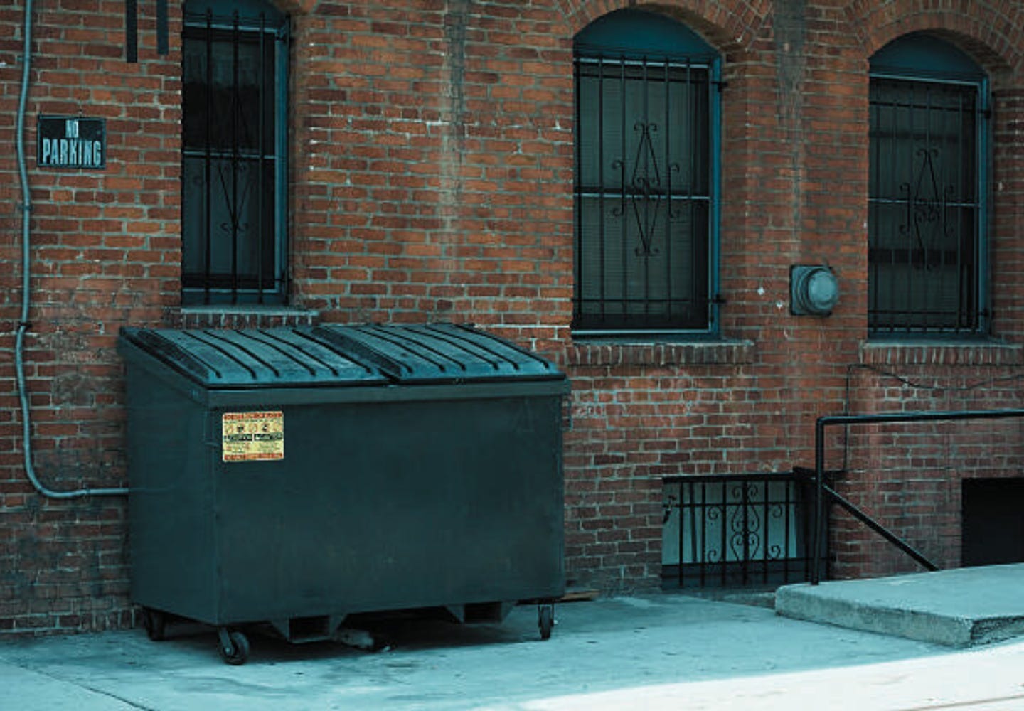 A dumpster outside of a brick building
AI-generated content may be incorrect. A dumpster outside of a brick building
AI-generated content may be incorrect.