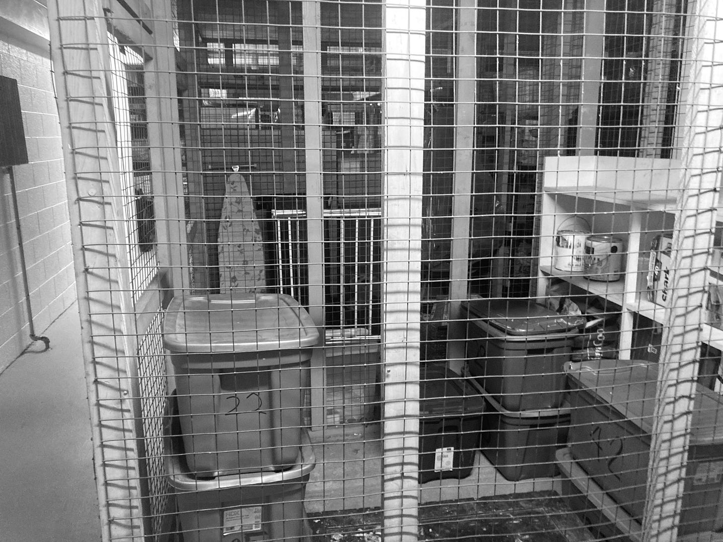 Image of storage locker with plastic bins Image of storage locker with plastic bins