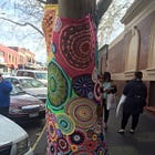 An altar, a tree, and 100 mini mandalas all crocheted to raise awareness about depression, suicide, and crafting to heal