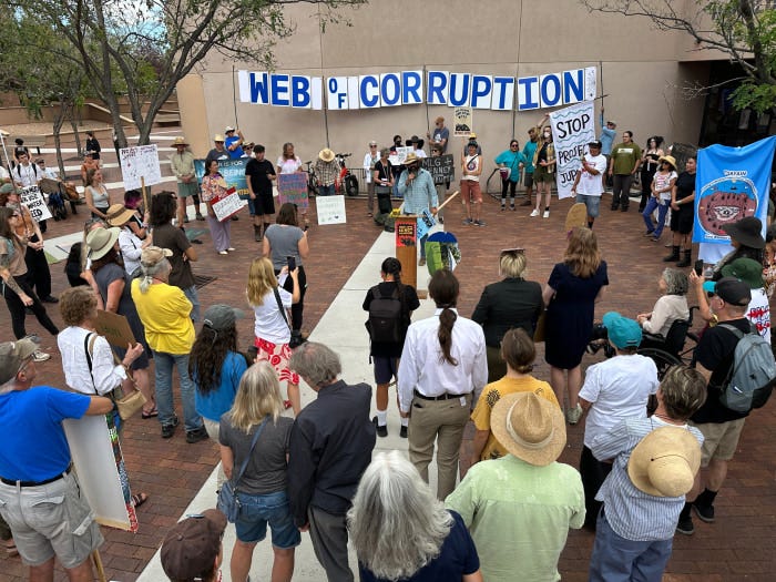Protesters gathered outside the New Mexico Environment Department in Santa Fe against the Project Jupiter data center.
